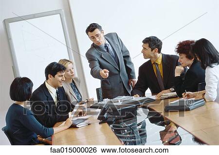Business meeting in conference room View Large Photo Image Stock Photograph - Business meeting in conference room. Fotosearch