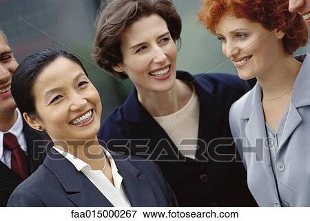 Business team smiling, portrait View Large Photo Image Stock Photo - Business team smiling, portrait. Fotosearch
