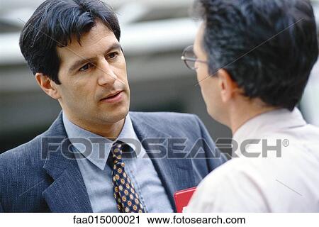 Businessmen talking face to face, head and shoulders View Large Photo Image Stock Image - Businessmen talking face to face, head and shoulders. Fotosearch