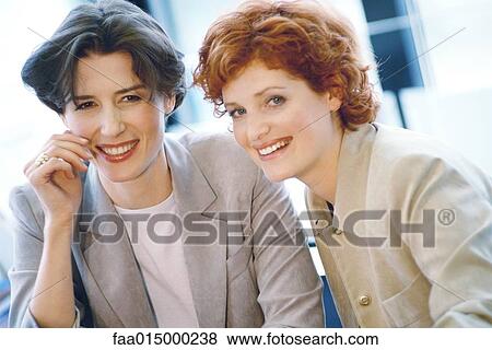 Businesswomen smiling View Large Photo Image Stock Photo - Businesswomen smiling. Fotosearch