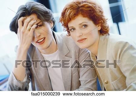 Businesswomen talking, close-up View Large Photo Image Stock Photo - Businesswomen talking, close-up. Fotosearch