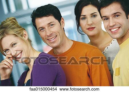 Four young adults, casually dressed, portrait View Large Photo Image Picture - Four young adults, casually dressed, portrait. Fotosearch