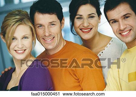 Four young adults, casually dressed, portrait View Large Photo Image Stock Image - Four young adults, casually dressed, portrait. Fotosearch