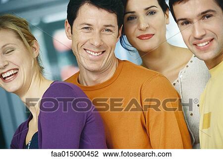 Four young adults, casually dressed, portrait View Large Photo Image Stock Image - Four young adults, casually dressed, portrait. Fotosearch
