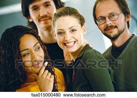 Four young adults, casually dressed, portrait View Large Photo Image Stock Image - Four young adults, casually dressed, portrait. Fotosearch
