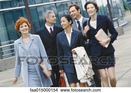 Group of business executives walking in business park View Large Photo Image Picture - Group of business executives walking in business park. Fotosearch
