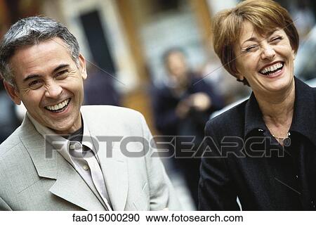 Mature couple laughing View Large Photo Image Stock Image - Mature couple laughing. Fotosearch