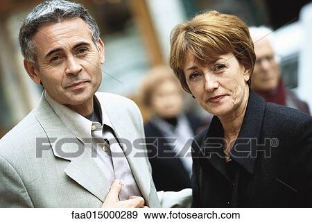 Mature couple looking at camera View Large Photo Image Stock Photo - Mature couple looking at camera. Fotosearch