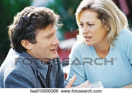 Stock Photograph - Mature couple talking. Fotosearch
