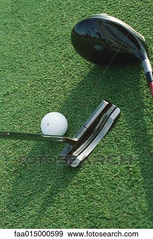 Putter, driver and golf ball on turf, close-up View Large Photo Image Stock Photo - Putter, driver and golf ball on turf, close-up. Fotosearch