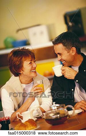 Senior couple having breakfast View Large Photo Image Stock Photo - Senior couple having breakfast. Fotosearch
