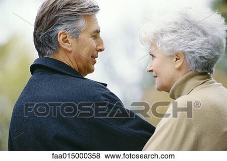 Senior couple, looking at each other View Large Photo Image Stock Photo - Senior couple, looking at each other. Fotosearch