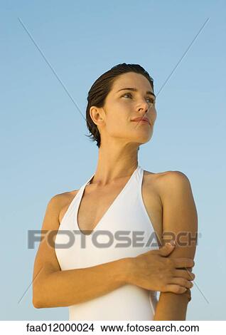 Woman wearing halter top, portrait View Large Photo Image Picture - Woman wearing halter top, portrait. Fotosearch