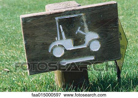 Wooden sign with golf cart and arrow View Large Photo Image Stock Photo - Wooden sign with golf cart and arrow. Fotosearch