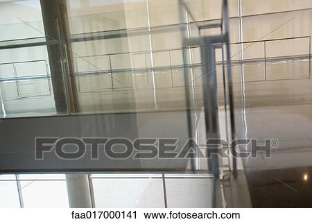 Stock Image - Architectural view of office building interior. Fotosearch