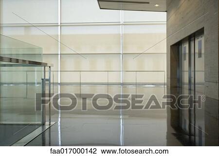 Stock Image - Architectural view of office building interior. Fotosearch