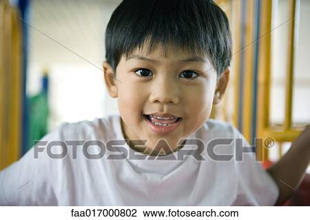 Boy, head and shoulders, portrait View Large Photo Image Stock Image - Boy, head and shoulders, portrait. Fotosearch