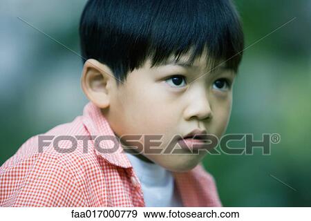 Stock Photo - Boy, head and shoulders, portrait. Fotosearch