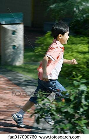 Stock Image - Boy running. Fotosearch