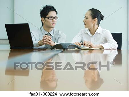 Business executives working in conference room View Large Photo Image Picture - Business executives working in conference room. Fotosearch