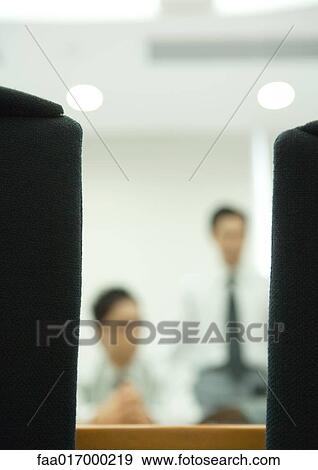 Business meeting, blurred silhouettes View Large Photo Image Stock Photo - Business meeting, blurred silhouettes. Fotosearch