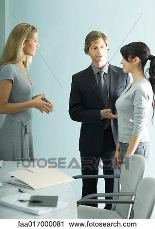 Businessman introducing teenage girl to young professional woman View Large Photo Image Stock Image - Businessman introducing teenage girl to young professional woman. Fotosearch