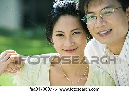Couple, smiling at camera, portrait View Large Photo Image Stock Photography - Couple, smiling at camera, portrait. Fotosearch