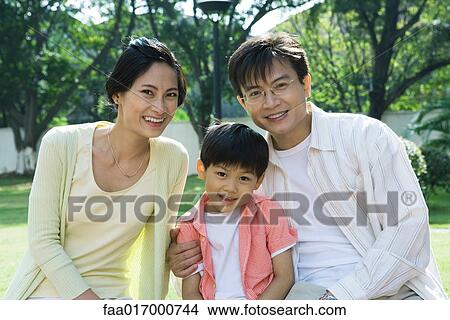 Picture - Family, smiling at camera, portrait. Fotosearch