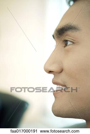 Stock Image - Man's face, close-up profile. Fotosearch
