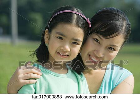 Stock Image - Mother and daughter, portrait. Fotosearch
