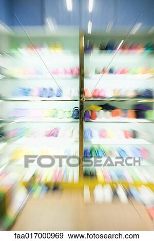 Shoe store, blurre View Large Photo Image Stock Photo - Shoe store, blurre. Fotosearch