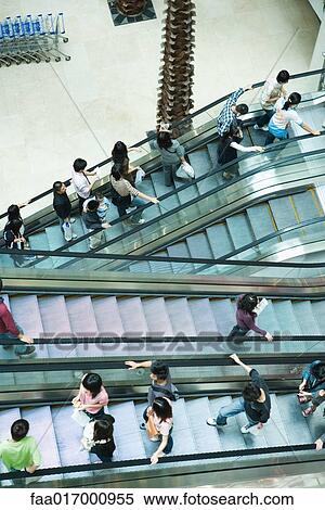 Stock Photography - Shopping mall escalators, high angle view. Fotosearch