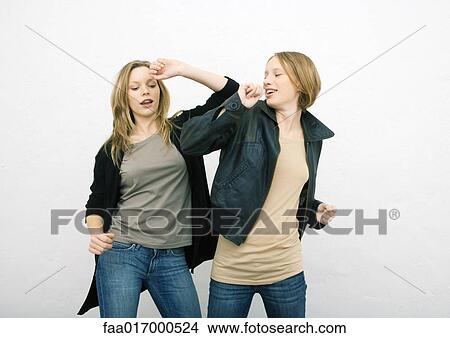 Picture - Teenage girls dancing. Fotosearch