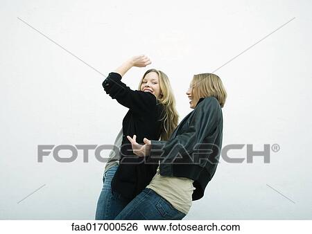 Teenage girls dancing View Large Photo Image Stock Photograph - Teenage girls dancing. Fotosearch