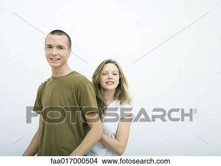 Picture - Young couple, white background. Fotosearch
