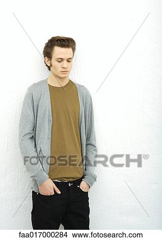 Picture - Young man with eyes closed, portrait. Fotosearch