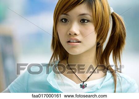 Young woman, portrait View Large Photo Image Stock Image - Young woman, portrait. Fotosearch