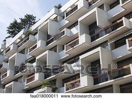 Apartment building, low angle view View Large Photo Image Stock Image - Apartment building, low angle view. Fotosearch