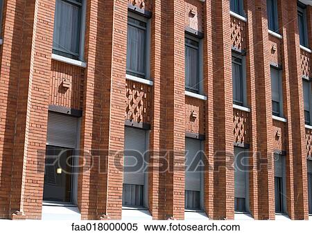 Apartment building made of red brick View Large Photo Image Stock Photography - Apartment building made of red brick. Fotosearch