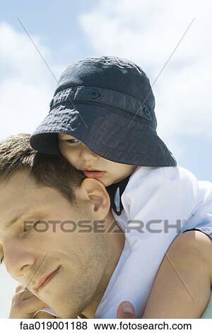 Baby on father's shoulders View Large Photo Image Stock Photo - Baby on father's shoulders. Fotosearch