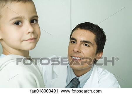 Boy and doctor View Large Photo Image Stock Image - Boy and doctor. Fotosearch