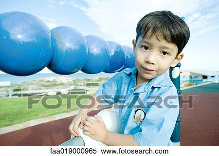 Stock Photography - Boy on playground. Fotosearch
