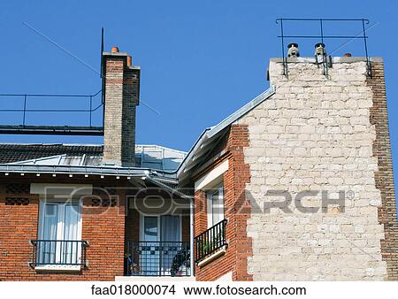 Brick apartment building, high section View Large Photo Image Picture - Brick apartment building, high section. Fotosearch