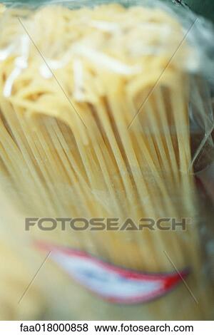 Stock Photo - Bucatini noodles, close-up. Fotosearch