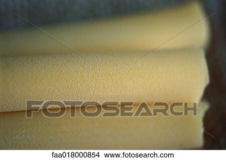 Picture - Bucatini noodles, extreme close-up. Fotosearch