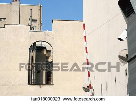 Building and crossing barrier View Large Photo Image Stock Image - Building and crossing barrier. Fotosearch