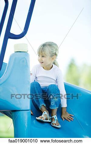 Child on playground equipment View Large Photo Image Stock Image - Child on playground equipment. Fotosearch