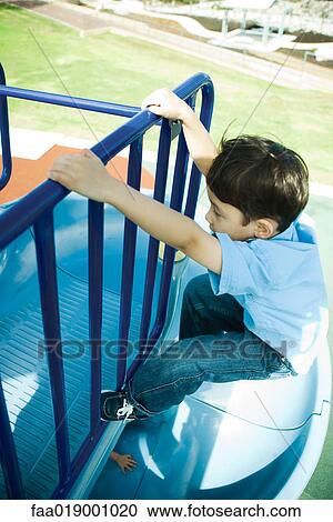 Child on playground equipment View Large Photo Image Stock Image - Child on playground equipment. Fotosearch