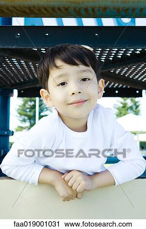 Child on playground equipment View Large Photo Image Stock Image - Child on playground equipment. Fotosearch