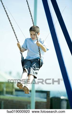 Child on swing View Large Photo Image Stock Image - Child on swing. Fotosearch
